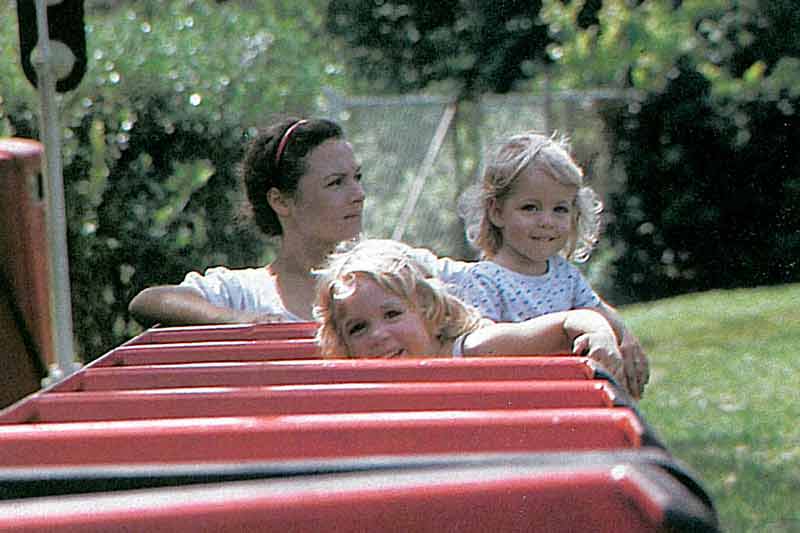 A historic photo of a family on the railroad ride at Lowry Park Zoo