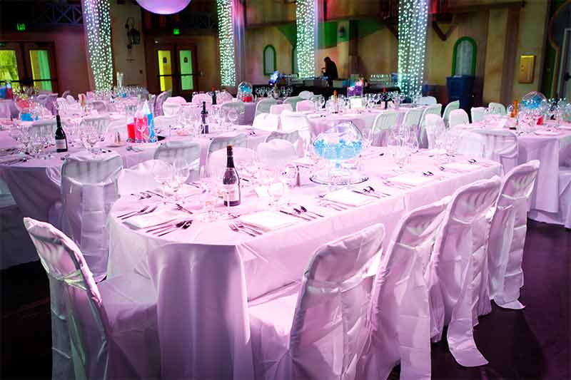 savanna-oasis-event-venue-with-classic-white-table-settings