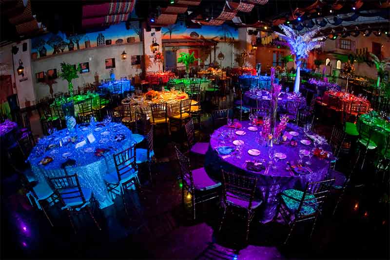 savanna-oasis-event-venue-with-colorful-table-settings